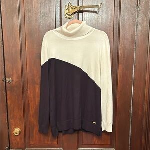 Calvin Klein Cream and Black Turtleneck Sweater with Modern Color Block Design